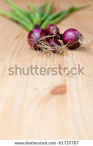 Organic purple spring onions