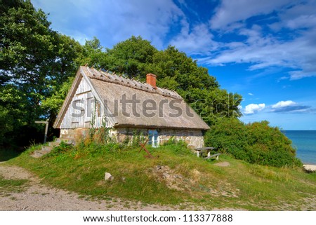 Traditional Swedish cottage house at Baltic Sea