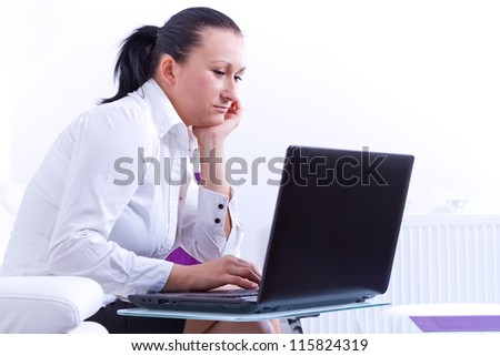 Business woman working on the laptop