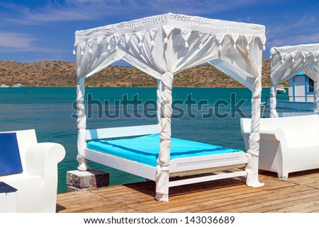 White luxury bed at Mirabello Bay on Crete, Greece