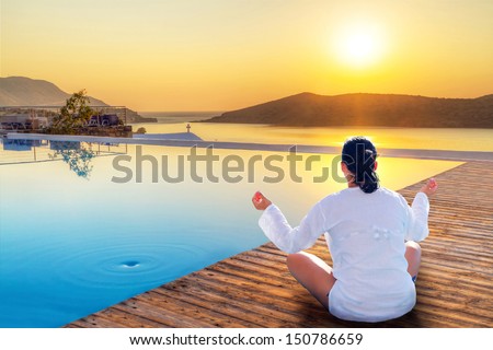 Meditation at sunrise in Greece