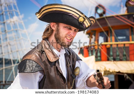 SOPOT, POLAND - 7 JUNE: Man posing in pirate outfit on Sopot molo, 7 June 2014. Sopot is major health and tourist resort destination and has the longest wooden pier in Europe.