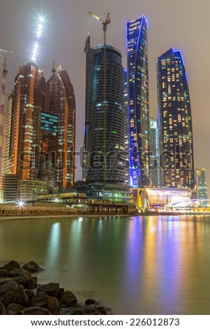ABU DHABI, UAE - 25 MARCH 2014: Etihad Towers buildings in Abu Dhabi, United Arab Emirates. Five towers complex with 74 floors is the third tallest building in Abu Dhabi.