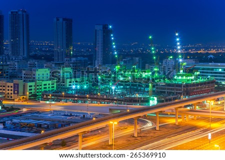 DUBAI, UAE - APRIL 3, 2014: Technology park of Dubai Internet City at night. Dubai Internet City is created by the government free economic zone for global information technology firms.