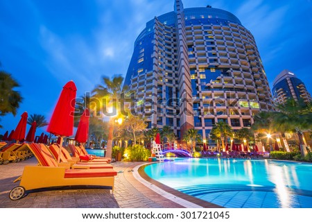 ABU DHABI, UAE -25 MARCH 2014: Pool area of resort Khalidiya Palace by Rotana, United Arab Emirates. Rotana Hotel Management Corporation has 85 properties in 26 cities around Middle East and Africa.