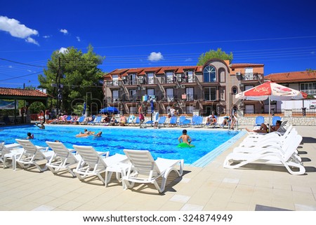 LAGANAS, GREECE - AUG 21, 2015: Swimming pool at the Perkes hotel in Laganas town of Zakynthos island, Greece.