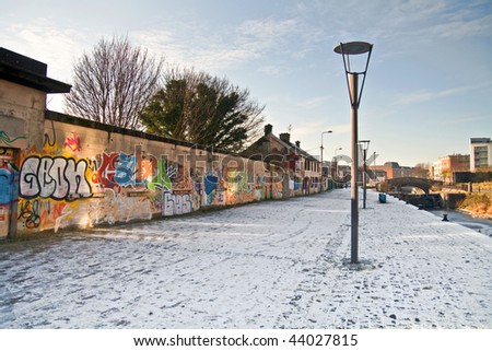 Similar – Image, Stock Photo Boringly colored concrete wall with a gap through which a bit of green creeps through.