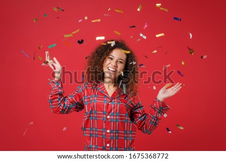 Similar – Image, Stock Photo Black woman scattering confetti on street