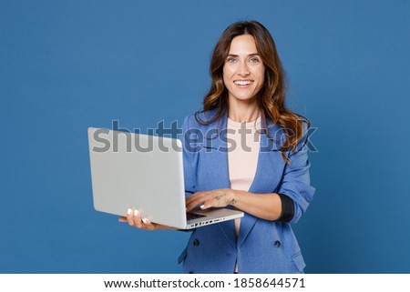 Similar – Image, Stock Photo Young brunette woman wearing casual coat writes sms online with smartphone chatting at street