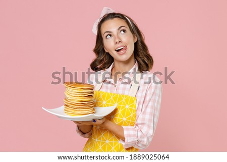 Image, Stock Photo Pensive Pretty Young Woman in a casual pose sits on a chair barefoot