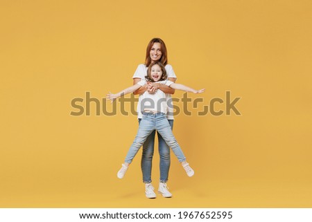 Similar – Image, Stock Photo Young mom playing with her baby in the sand