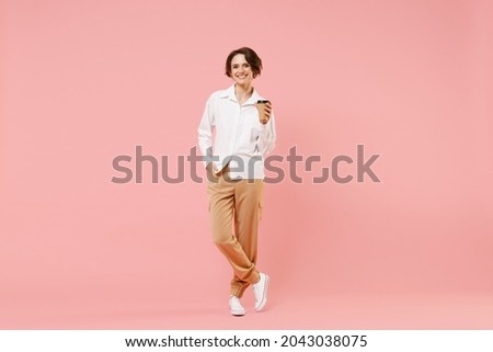 Similar – Image, Stock Photo Woman holding a cup of hot chocolate with marshmallows.