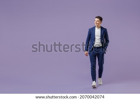 Similar – Image, Stock Photo Stylish man in suit walking on pavement with electric bike