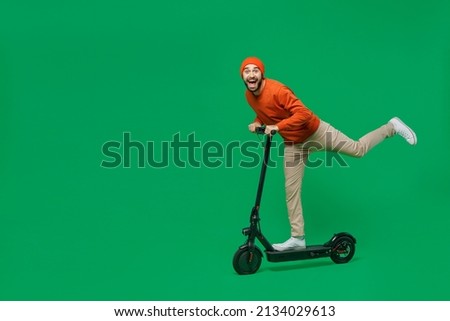 Similar – Image, Stock Photo Young man with electric bicycle in the autumn park