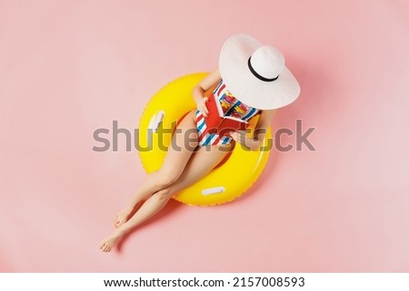 Similar – Image, Stock Photo Young woman in swimwear talking on cellphone at poolside