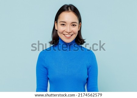 Similar – Image, Stock Photo Woman in light blue corduroy dress holds light blue bowl with mini eggplants in hand