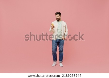 Similar – Image, Stock Photo Trendy man using smartphone in city