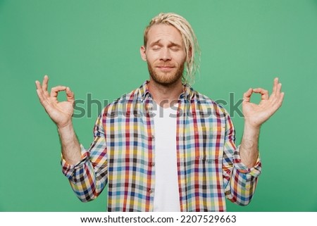 Similar – Image, Stock Photo Blond man practicing meditation at home