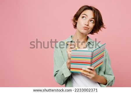 Similar – Image, Stock Photo Thoughtful woman reading book in living room