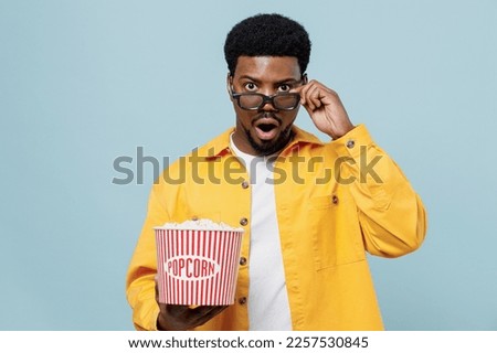 Similar – Image, Stock Photo Astonished boy with 3D glasses and popcorn