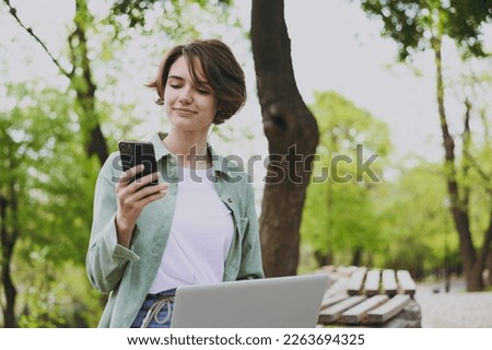 Similar – Foto Bild junge Frau benutzt eine Toilette mit einer leeren Rolle Toilettenpapier in der Hand.