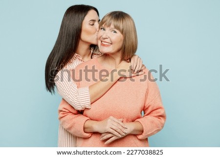 Similar – Image, Stock Photo Woman with daughter on sunny beach