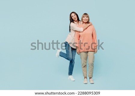 Similar – Image, Stock Photo Child stands at the lakeside at sunset and looks into the future