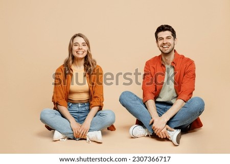 Similar – Image, Stock Photo Stylish young man sitting on concrete wall