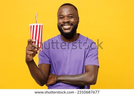 Similar – Image, Stock Photo Hand holding red cup with steaming drink against the light