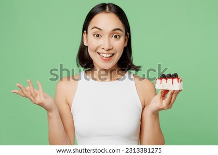 Similar – Image, Stock Photo Woman eating delicious cheesecake with jam