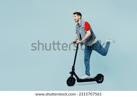 Similar – Image, Stock Photo Young man with electric bicycle in the autumn park