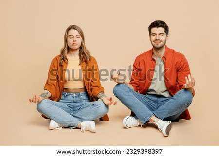 Similar – Image, Stock Photo Calm couple meditating together on mat at home