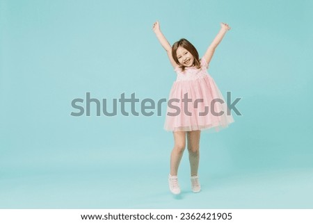 Similar – Image, Stock Photo Little girl walks by the hand of her mother and looks back smiling with a swing in her hair.