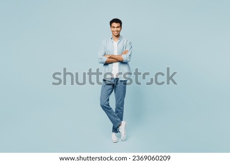 Image, Stock Photo Stylish young man standing near building