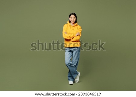 Similar – Image, Stock Photo Woman in yellow hoodie taking selfie on smartphone on rocky shore