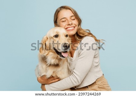 Image, Stock Photo Young woman in fur coat and lingerie sitting in snowy field