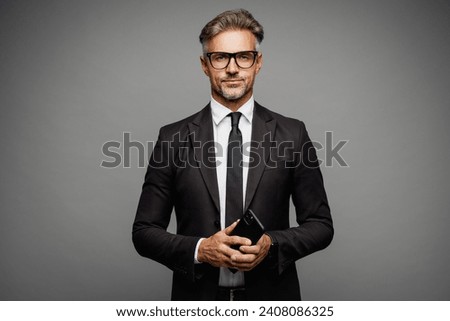 Similar – Image, Stock Photo Stylish businessman on cellphone in office