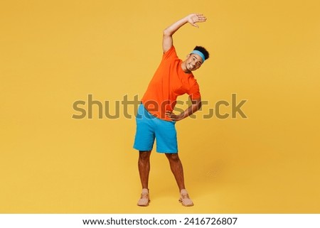 Similar – Image, Stock Photo Young man doing exercises outside on grass during his calisthenics workout