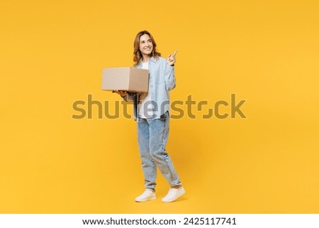 Similar – Image, Stock Photo Young woman holding yellow reusable bottle