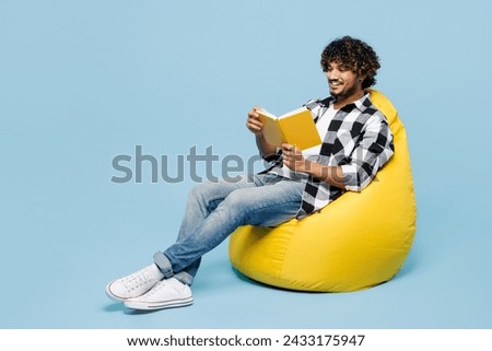 Similar – Image, Stock Photo Relaxed man reading notes in notebook