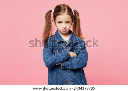 Image, Stock Photo Little girl, eight years old, sitting on the grass outdoors.