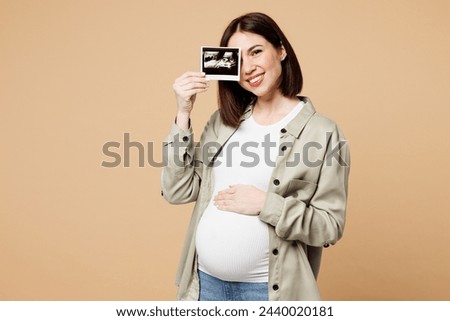 Similar – Image, Stock Photo Pregnant woman with sonogram picture on shore