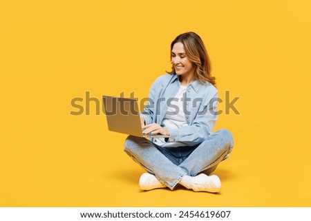 Similar – Image, Stock Photo Young woman holding yellow reusable bottle