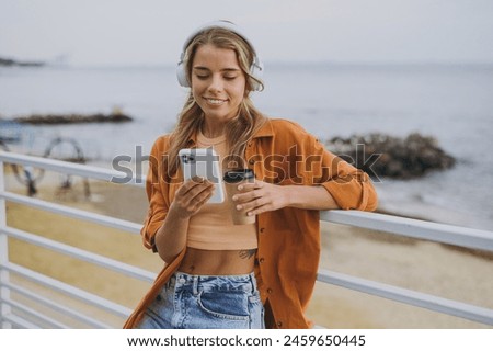 Similar – Image, Stock Photo Traveling woman drinking water from river