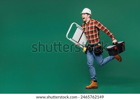 Similar – Image, Stock Photo Builder at work with wooden roof construction.