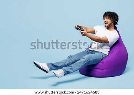 Similar – Image, Stock Photo Gamer playing video game at home