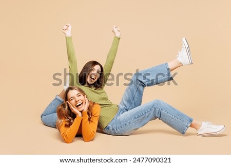 Similar – Image, Stock Photo two friends or sisters taking a picture outdoors with mobile phone over yellow background. technology and lifestyle concept