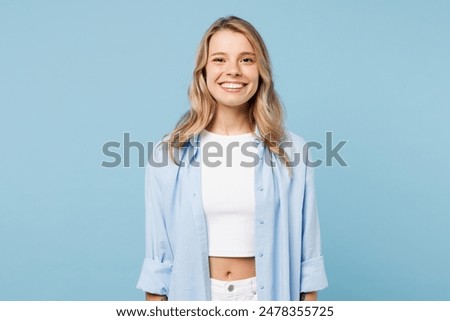 Similar – Image, Stock Photo Positive young female model in sportsclothes rides on blades enjoys leisure activities poses at urban place against blurred background stands in full length. Active lifestyle and rollerblading concept