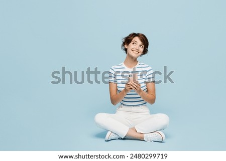 Similar – Image, Stock Photo young woman sit on blue yoga or fitness mat after working out. keep fit concepts image