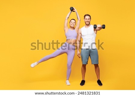 Similar – Image, Stock Photo Cheerful couple training together standing in folded leaf position on mat together in studio